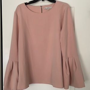 Top with bell sleeves